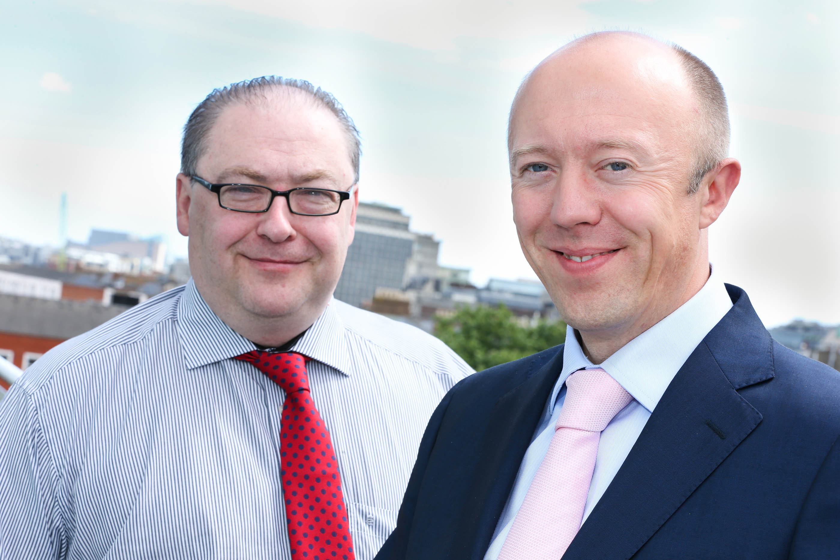 Pictured announcing the deal: Andrew Hillis, Group Head of Information Services, at Almac Group (Left) and Tom O'Connor, Director, Version 1 (Right).