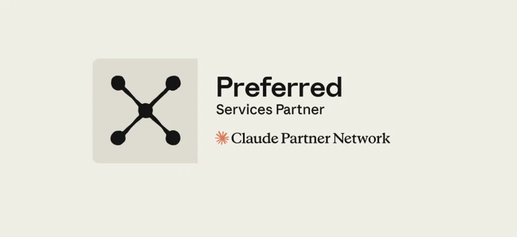 Claude Preferred Services Partner badge indicating official implementation expertise within the Claude Partner Network. The badge features a black network-style icon with four connected nodes on the left, and the text “Preferred Services Partner” above the Claude Partner Network logo and name on a light beige background.