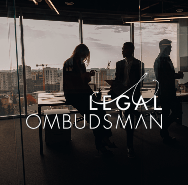 business people in silhouette with legal ombudsman logo overlaid