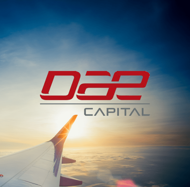 plane wing in sky with DAE capital logo overlaid