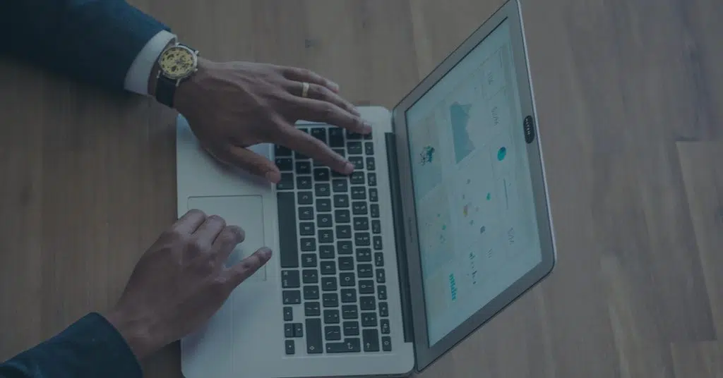 Hands at a laptop