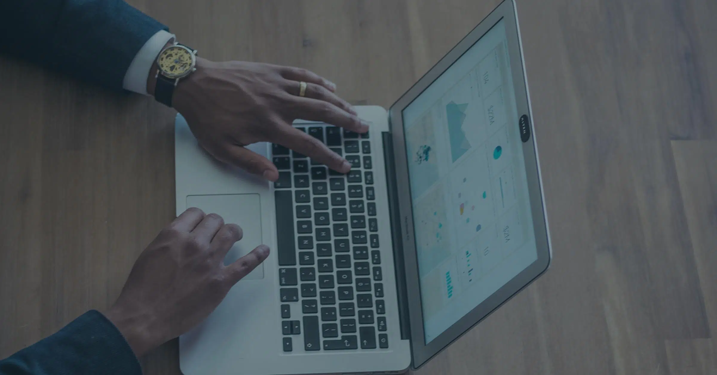 Hands at a laptop