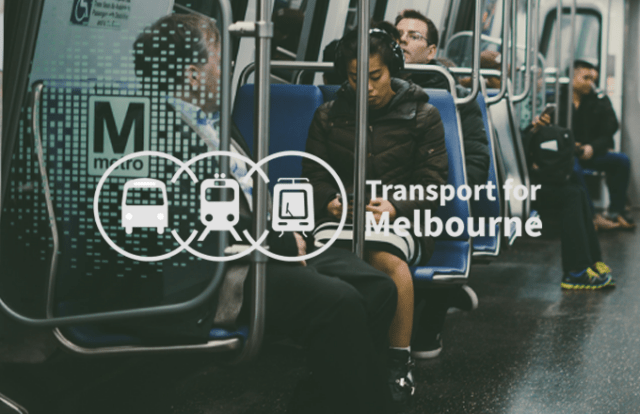 Transport for Melbourne logo over an image of people on a train