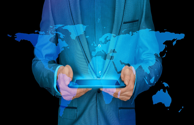 person holding tablet with a digital map of the world coming out of it