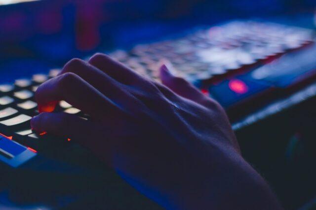 hand on a computer keyboard