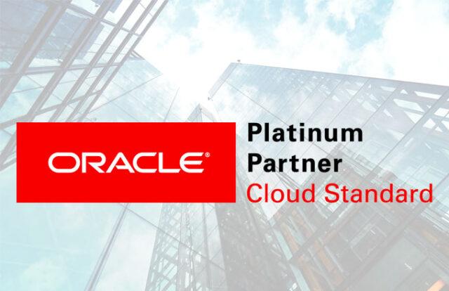 ORACLE logo against an image of a skyscraper