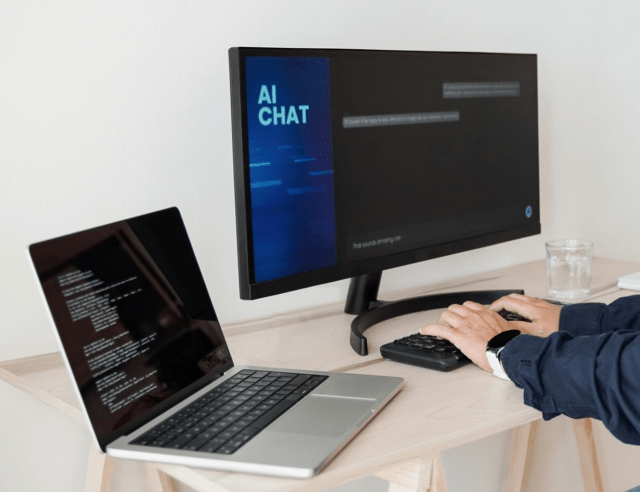 Computer screen and laptop