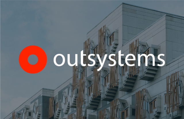 Outsystems logo over a building face