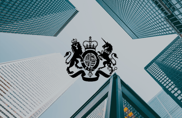 The royal coat of arms graphic laid over an image of a skyscraper