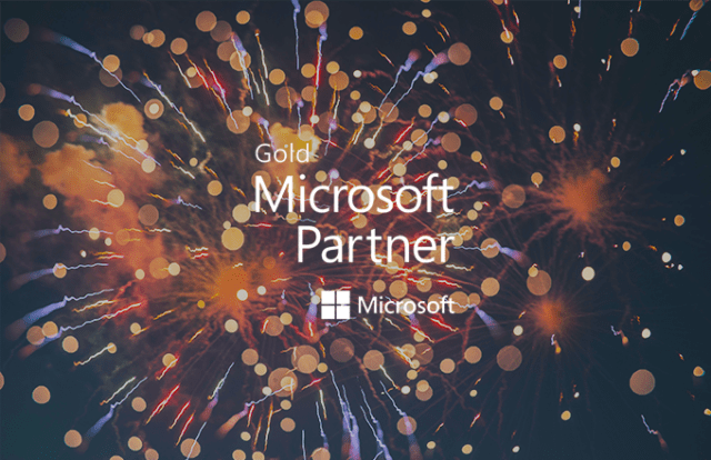 Gold Microsoft Partner logo laid over an image of fireworks