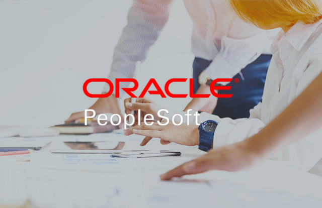 oracle logo over image in people at a desk