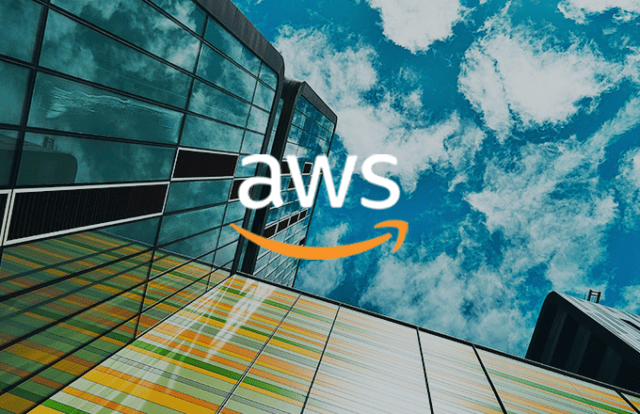 glass building and sky with AWS logo