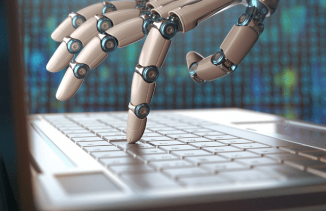 robotic hand typing on keyboard
