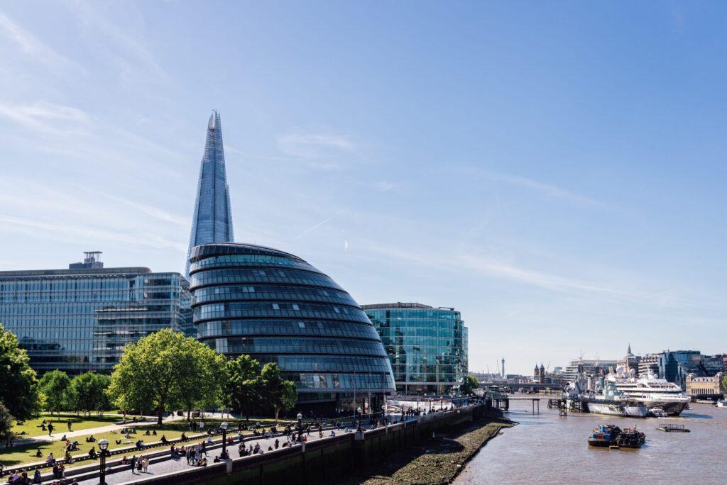 conic view of the City Hall of London and Shard skyscraper