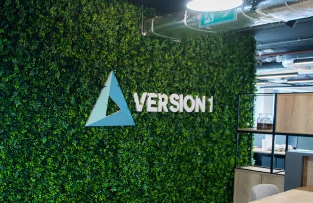 version 1 logo and living wall