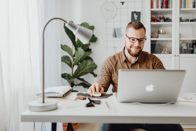 Man at desk on laptop