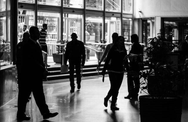 Lobby of an office filled with people