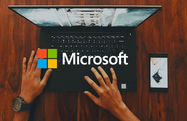 Hands at a laptop