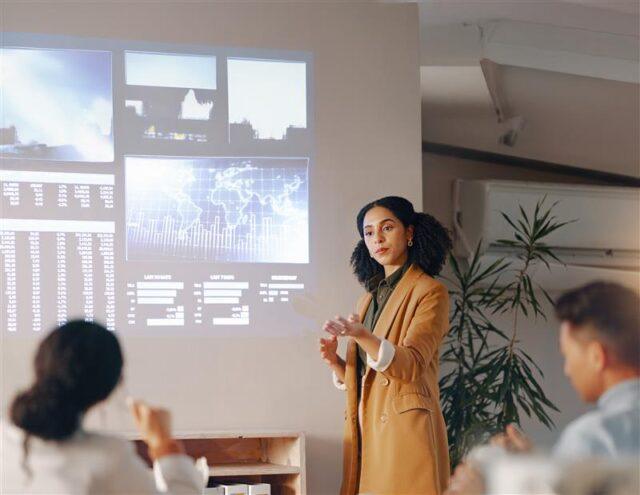 Lady presenting to audience
