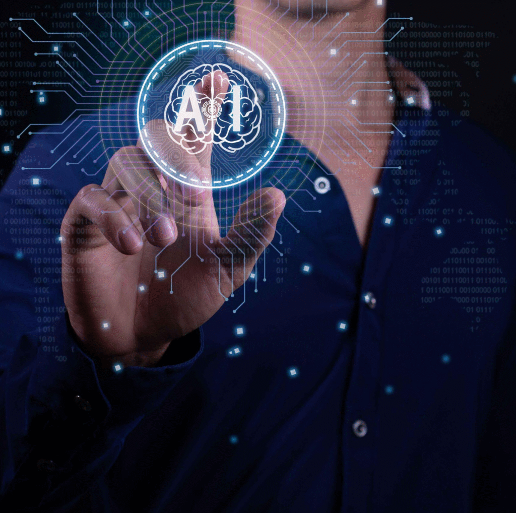 Person touching a digital interface displaying a glowing AI brain icon, representing artificial intelligence technology and human interaction with data systems.
