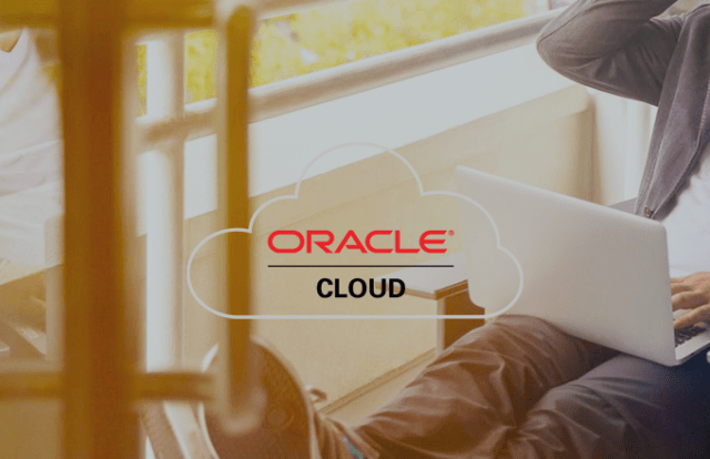 A person sits with a laptop in a bright indoor space, with the Oracle Cloud logo displayed prominently in the foreground inside an outlined cloud shape. If you want a shorter, longer, or SEO‑optimised ver