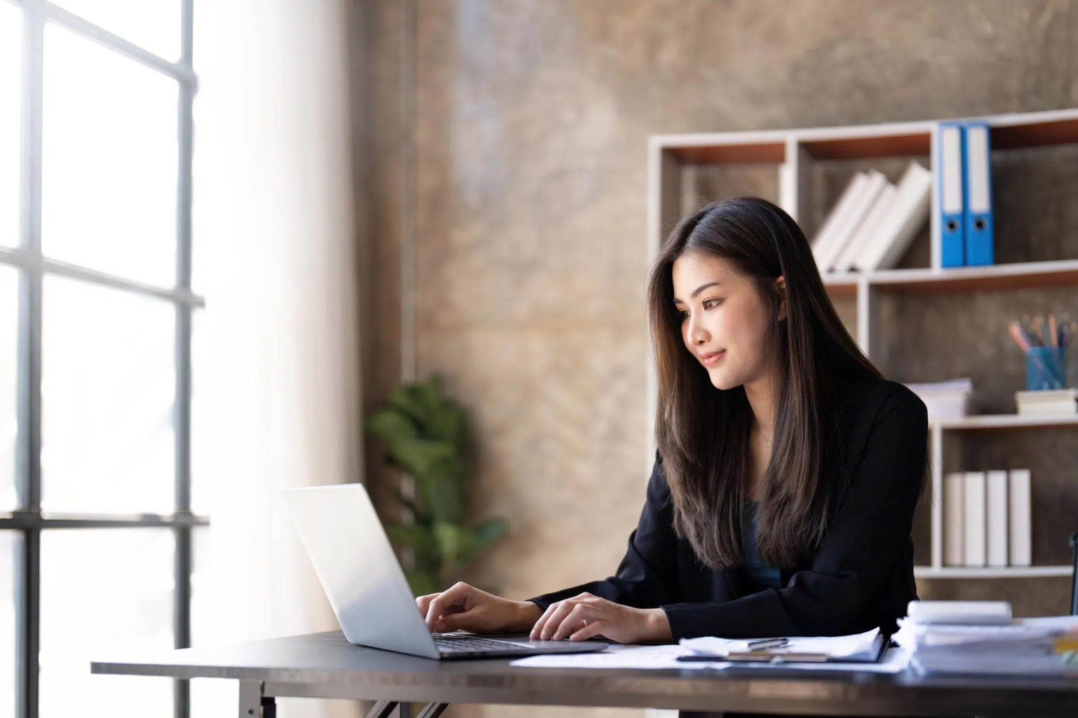 Woman working on laptop